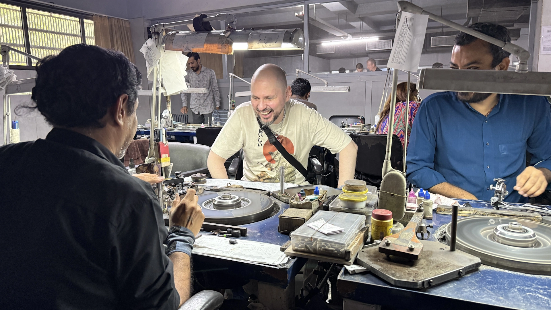 AZENA founder Slava Kravtchenko at a cutting bench in Surat, India with long-term partners.